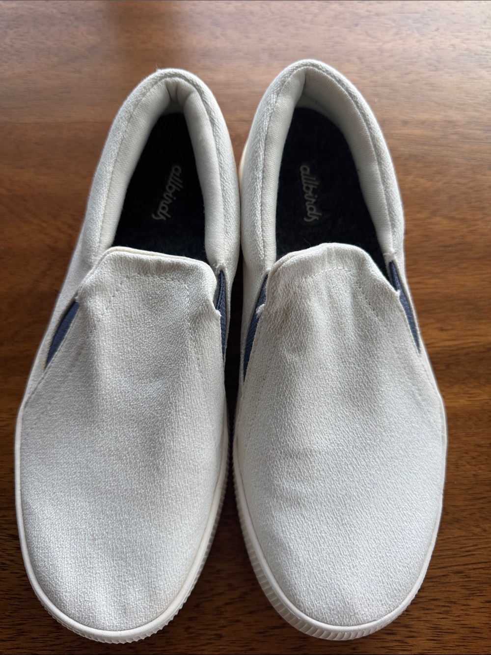 allbirds Women's Slip-On Sneakers in white with Navy Accents